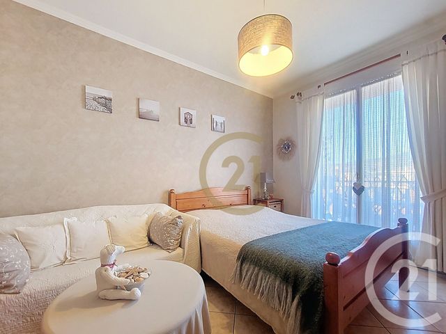 Appartement T3 à vendre - 3 pièces - 70.36 m2 - DRAGUIGNAN - 83 - PROVENCE-ALPES-COTE-D-AZUR - Century 21 Haussmann Immobilier