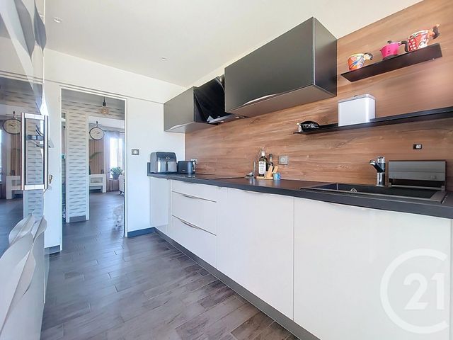 Afficher la photo en grand Appartement F4 à vendre - 4 pièces - 83.02 m2 - DRAGUIGNAN - 83 - PROVENCE-ALPES-COTE-D-AZUR - Century 21 Haussmann Immobilier